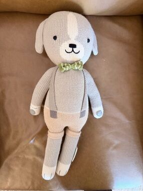 Plush Knit Cuddle + Kind Dog Toy in Beige with Green Bow